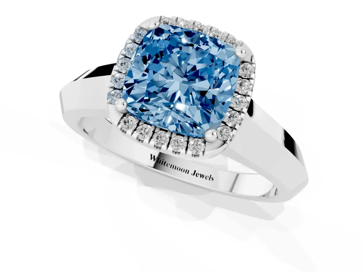 Fancy Blue Cushion Cut Halo Diamond Ring with Cathedral Band and Four-Prong Setting Silver