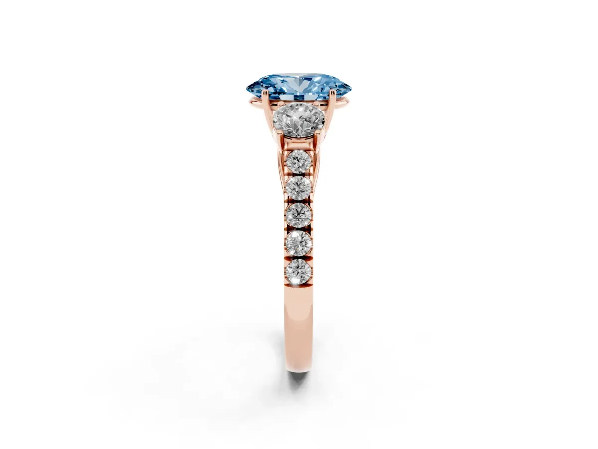 Fancy Blue Oval Cut Cut Diamond Three-Stone Ring with Round Side Stones and Pavé Band Rose gold