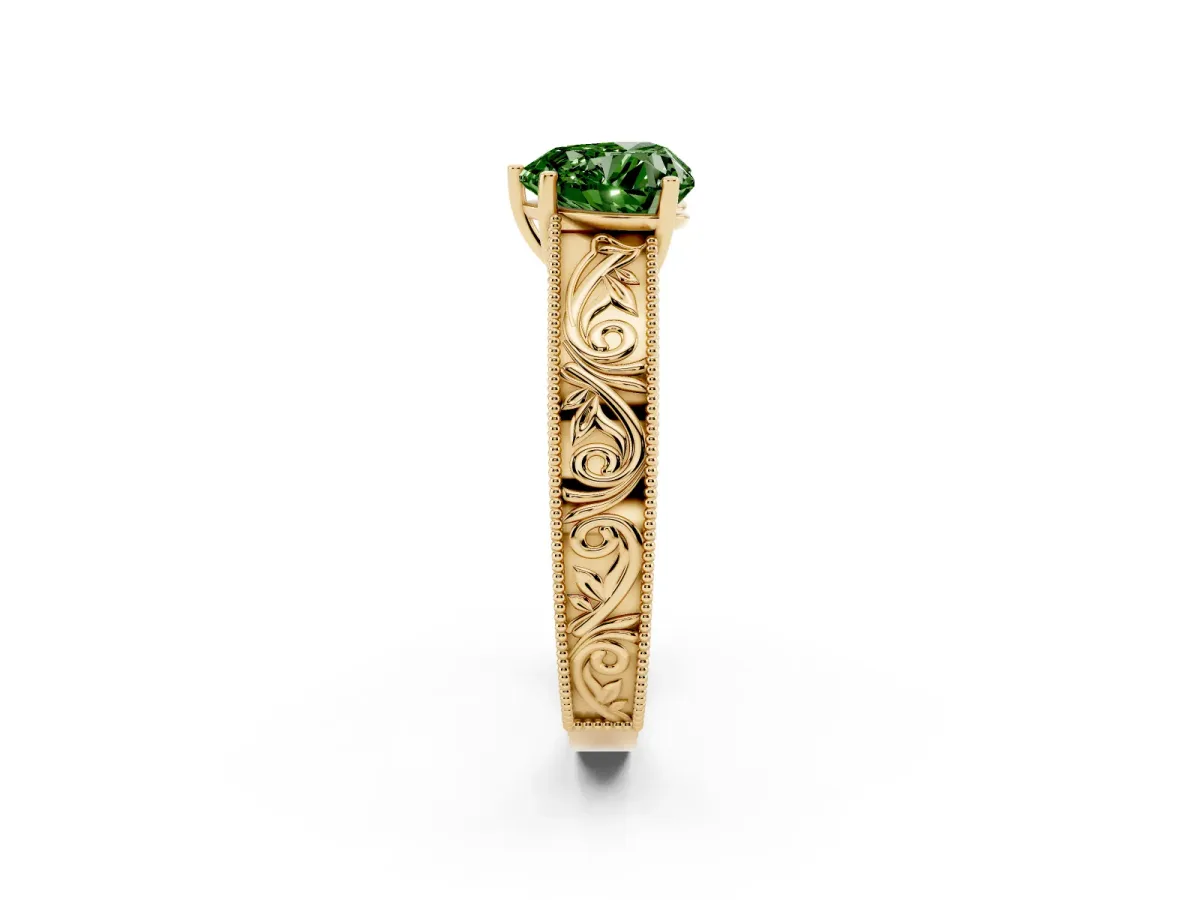 Fancy Green Heart Cut Diamond Solitaire Ring with Engraved Band and Four-Prong Setting Yellow gold