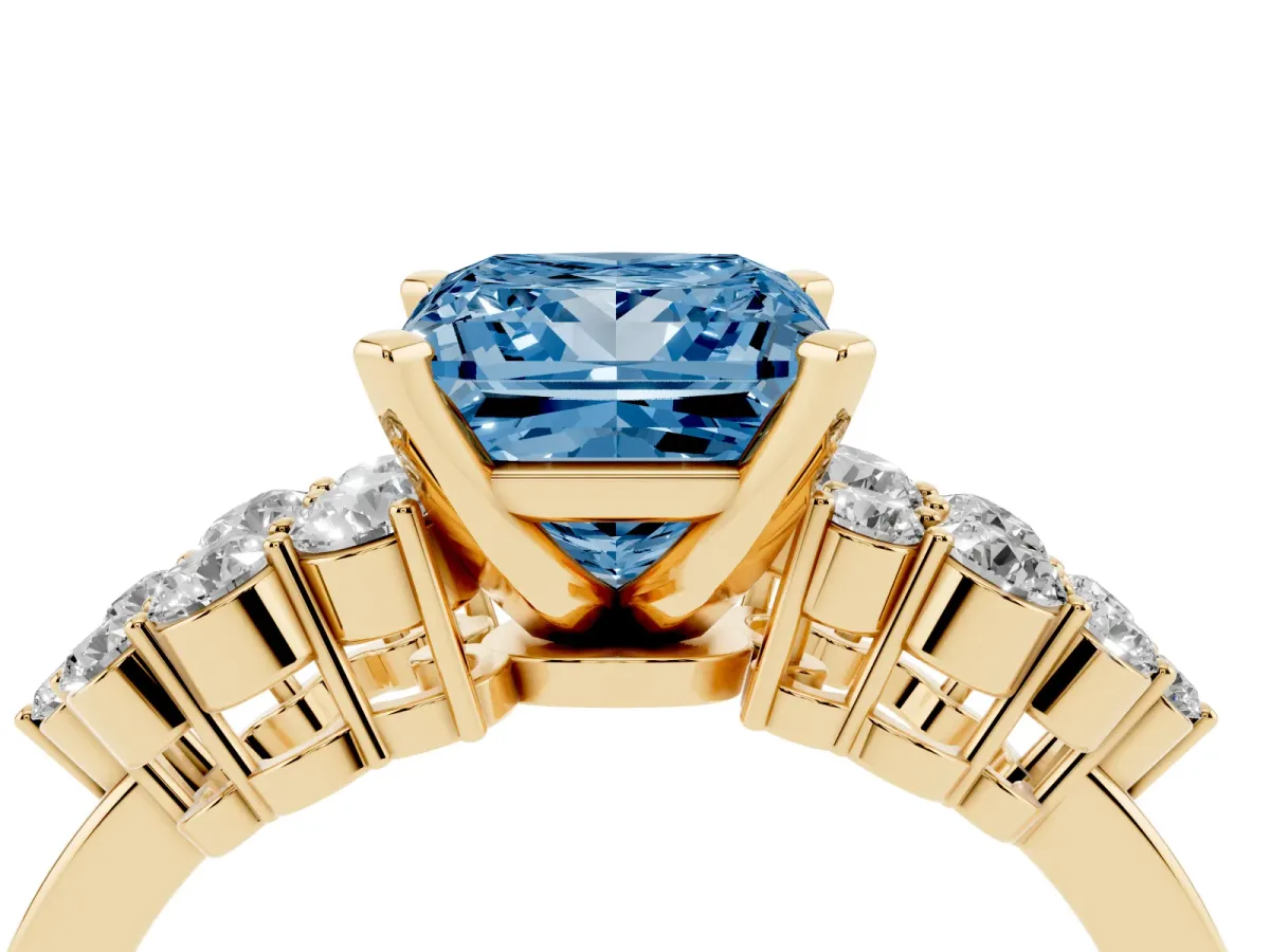 Fancy Blue Princess Cut Cluster Diamond Engagement Ring with Pavé Band and Four-Prong Setting Yellow gold