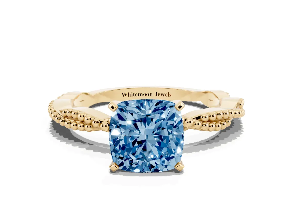 Fancy Blue Cushion Cut Solitaire Twisted Band with Bead Prong Setting Yellow gold