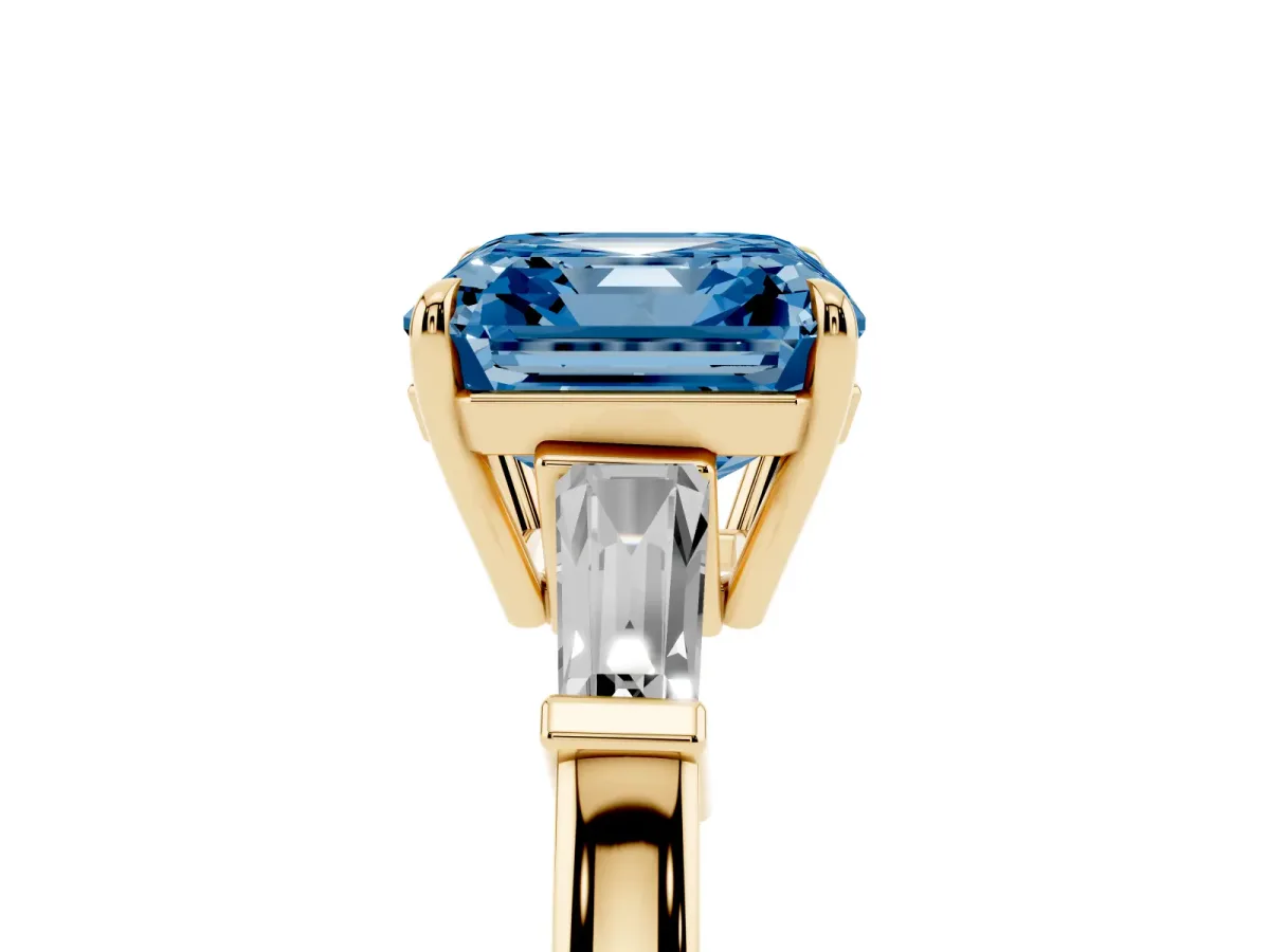 Fancy Blue Asscher Cut Diamond Three-Stone Ring with Tapered Baguette Side Stones and Prong Setting Yellow gold