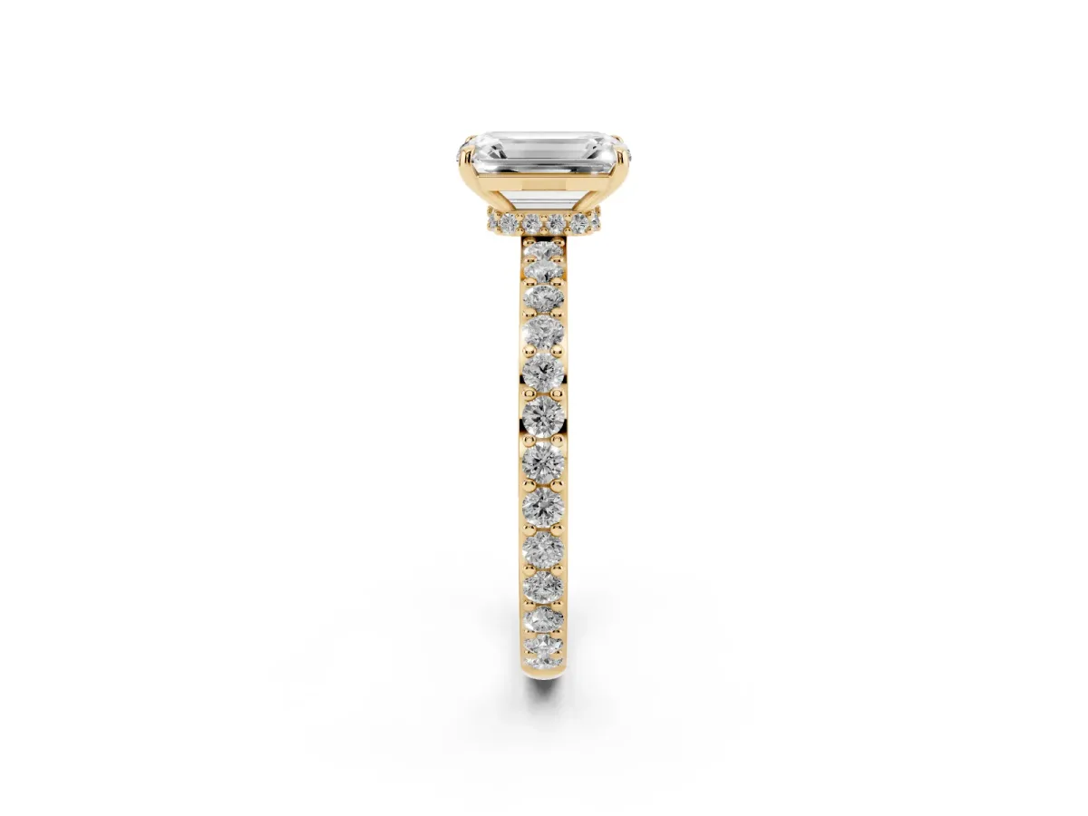 Emerald Cut Diamond Solitaire Engagement Ring with Pavé Band and Four-Prong Setting Yellow gold