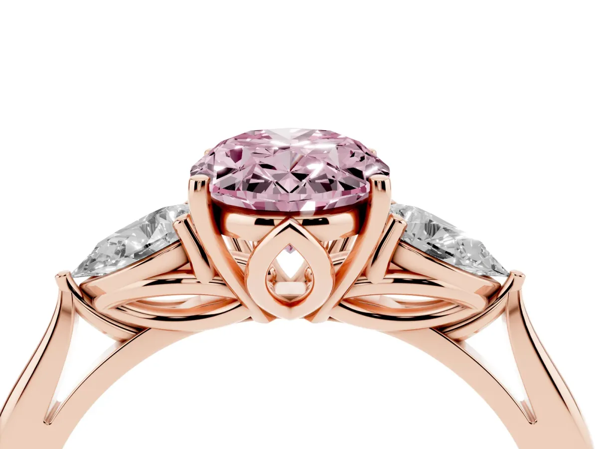 Fancy Pink Three-Stone Oval Cut Diamond Ring with Pear Side Stones in Four-Prong Setting Rose gold