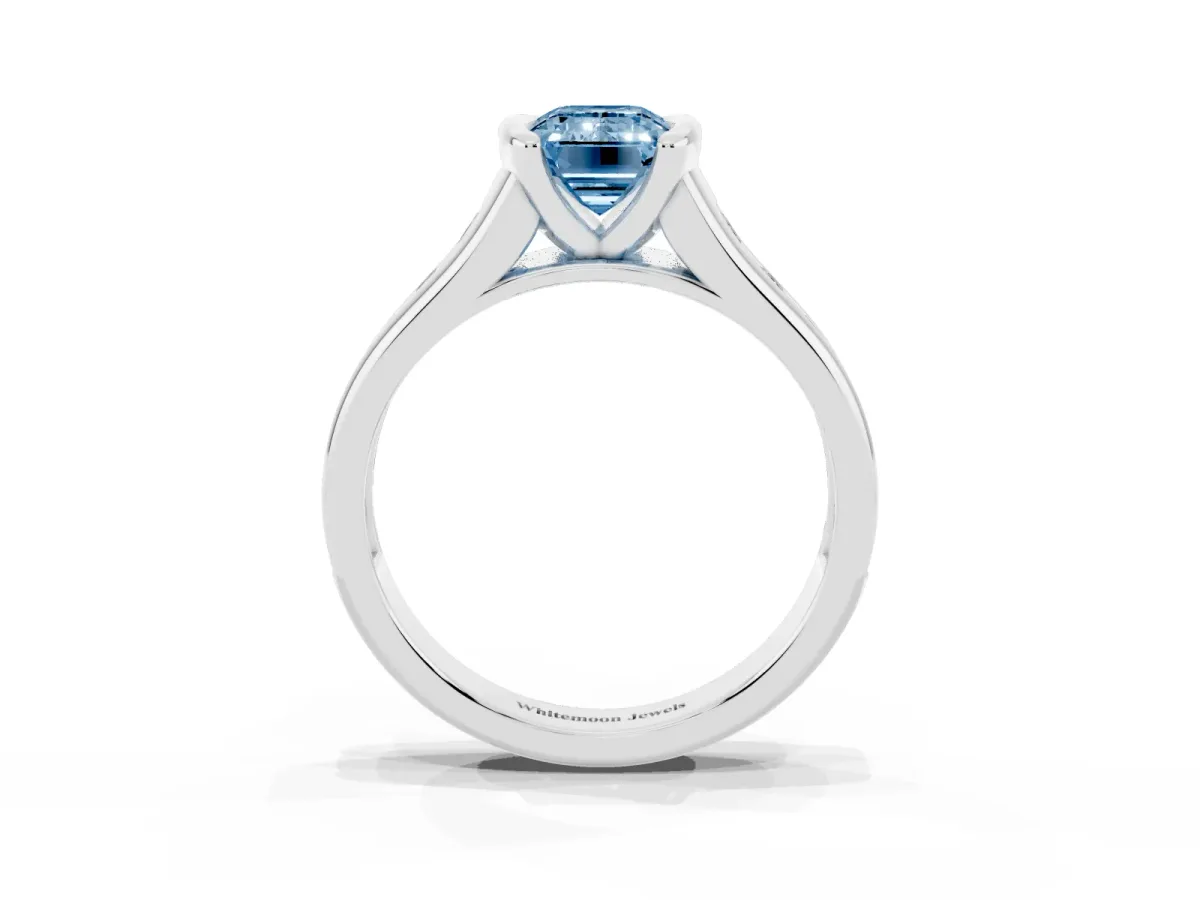 Fancy Blue Emerald Cut Solitaire Bezel-Set Diamond Ring with Channel-Set Band Platinum