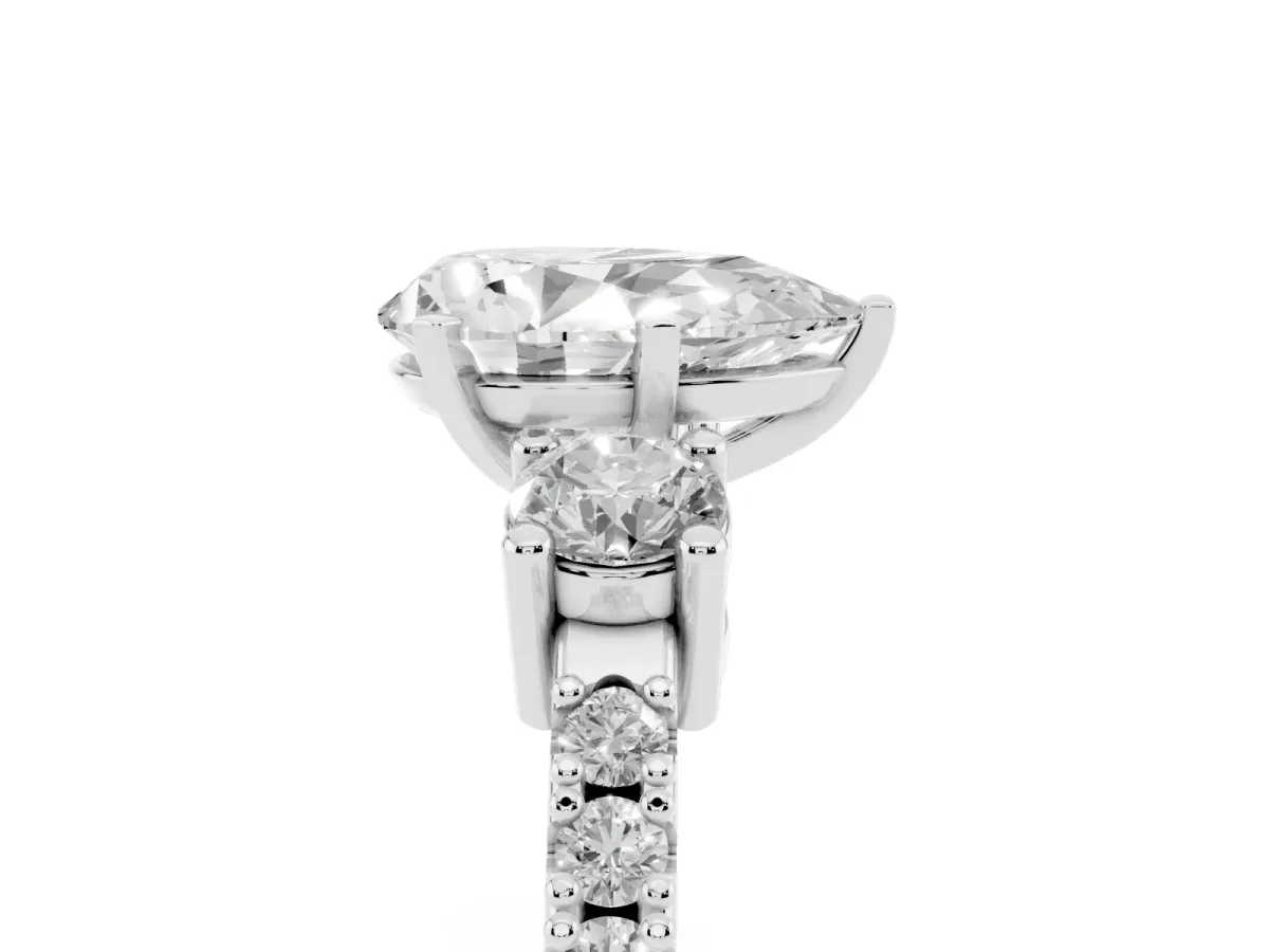 Pear Cut Three-Stone Diamond Pavé Band with Prong Setting Platinum