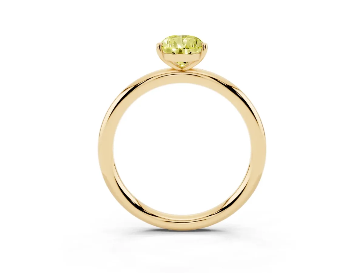 Fancy Yellow Pear Cut Solitaire Diamond Ring with Four-Prong Setting on a Plain Band Yellow gold