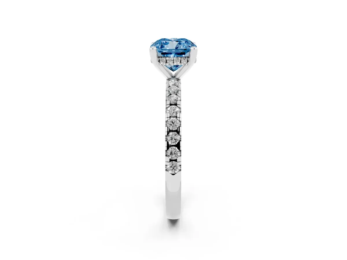 Fancy Blue Cushion Cut Diamond Solitaire Ring with Round Pavé Band and Four-Prong Setting Silver