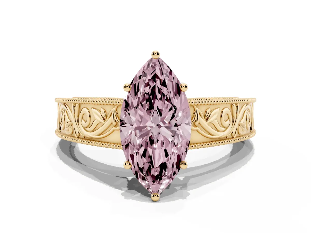 Fancy Pink Marquise Cut Diamond Solitaire Ring with Engraved Band and Four-Prong Setting Yellow gold