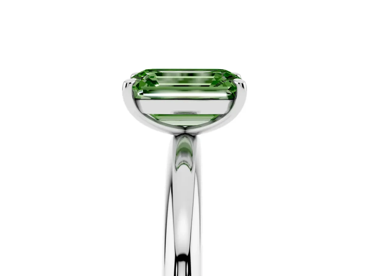 Fancy Green Emerald Cut Solitaire Diamond Ring with Four-Prong Setting on a Plain Band Platinum