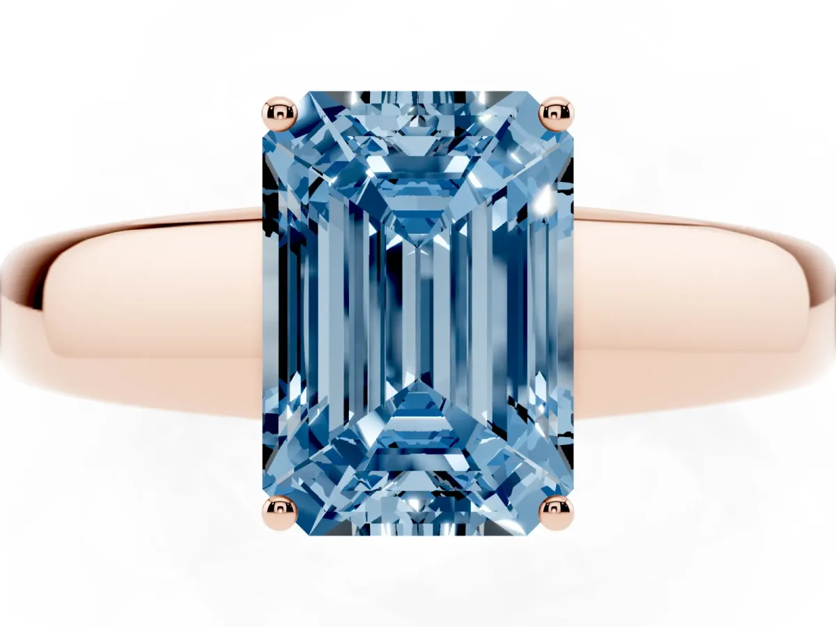 Fancy Blue Emerald Cut Solitaire Diamond Ring with Tapered Band and Four-Prong Setting Rose gold