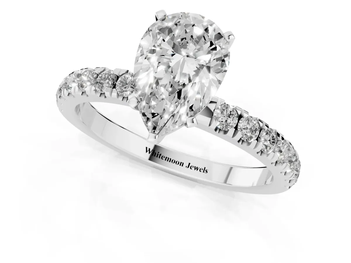 Pear Cut Diamond Solitaire Ring with Pavé Accents and Four-Prong Setting Silver