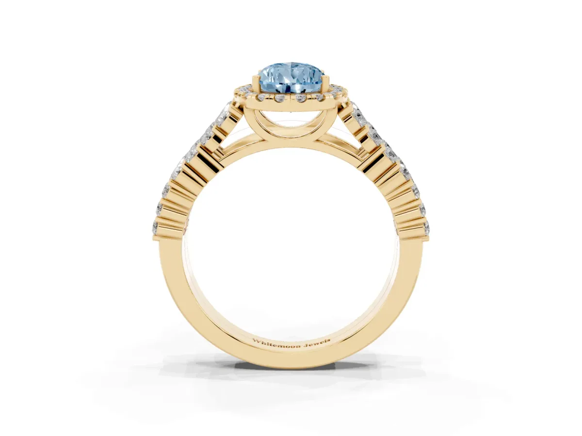 Fancy Blue Pear Cut Diamond Halo Engagement Ring with Triple Row Round Pavé Band and Prong Setting Yellow gold