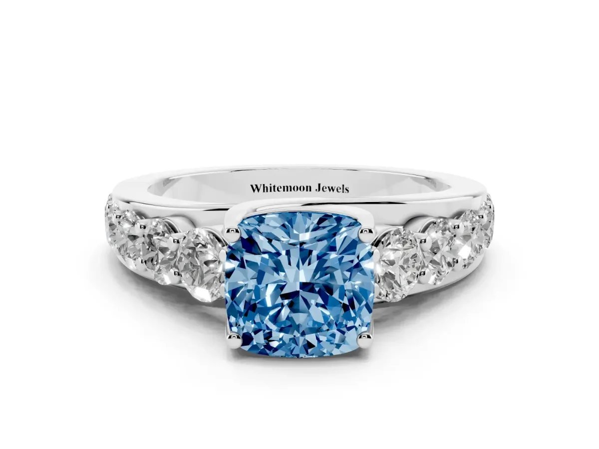 Fancy Blue Cushion Cut Diamond Engagement Ring with Pavé Band and Four-Prong Setting Silver