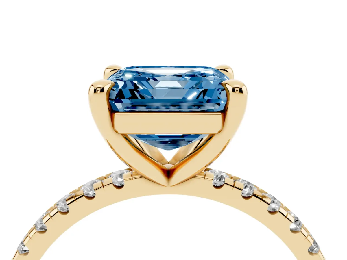 Fancy Blue Asscher Cut Diamond Brilliant Solitaire Ring with Pavé Band and Four-Prong Setting Yellow gold