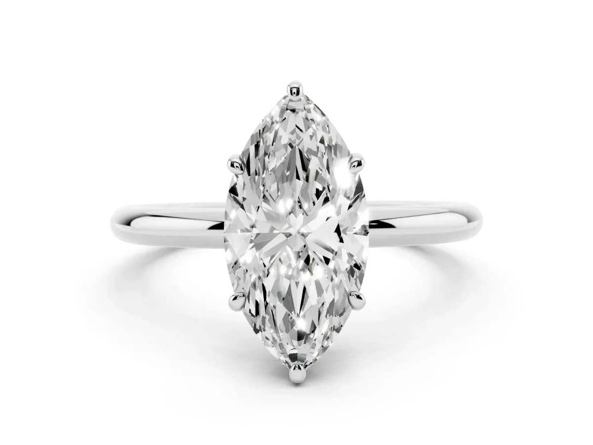 Marquise Cut Solitaire Diamond Ring with Four-Prong Setting on a Plain Band Platinum