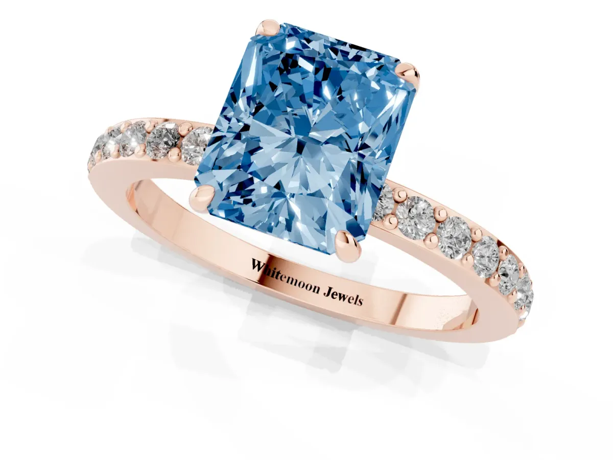 Fancy Blue Radiant Cut Diamond Pavé Engagement Ring with Round Accents and Prong Setting Rose gold