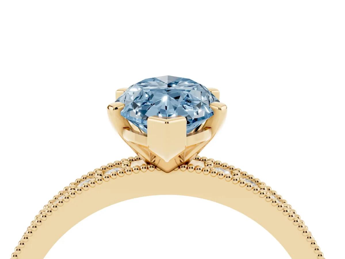 Fancy Blue Marquise Cut Diamond Milgrain Pavé Engagement Ring with Four-Prong Setting Yellow gold