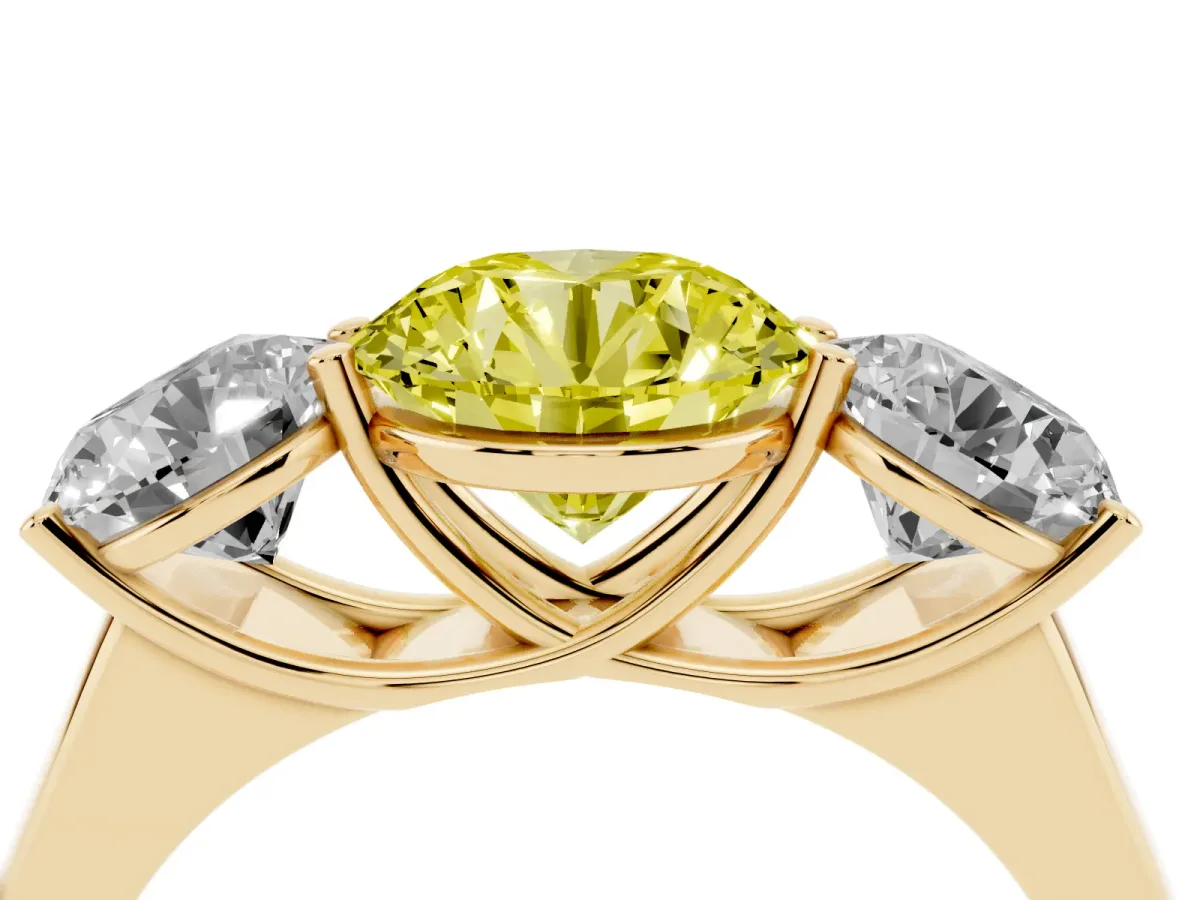 Fancy Yellow Round Cut Three-Stone Diamond Ring with Prong Setting on a Classic Band Yellow gold