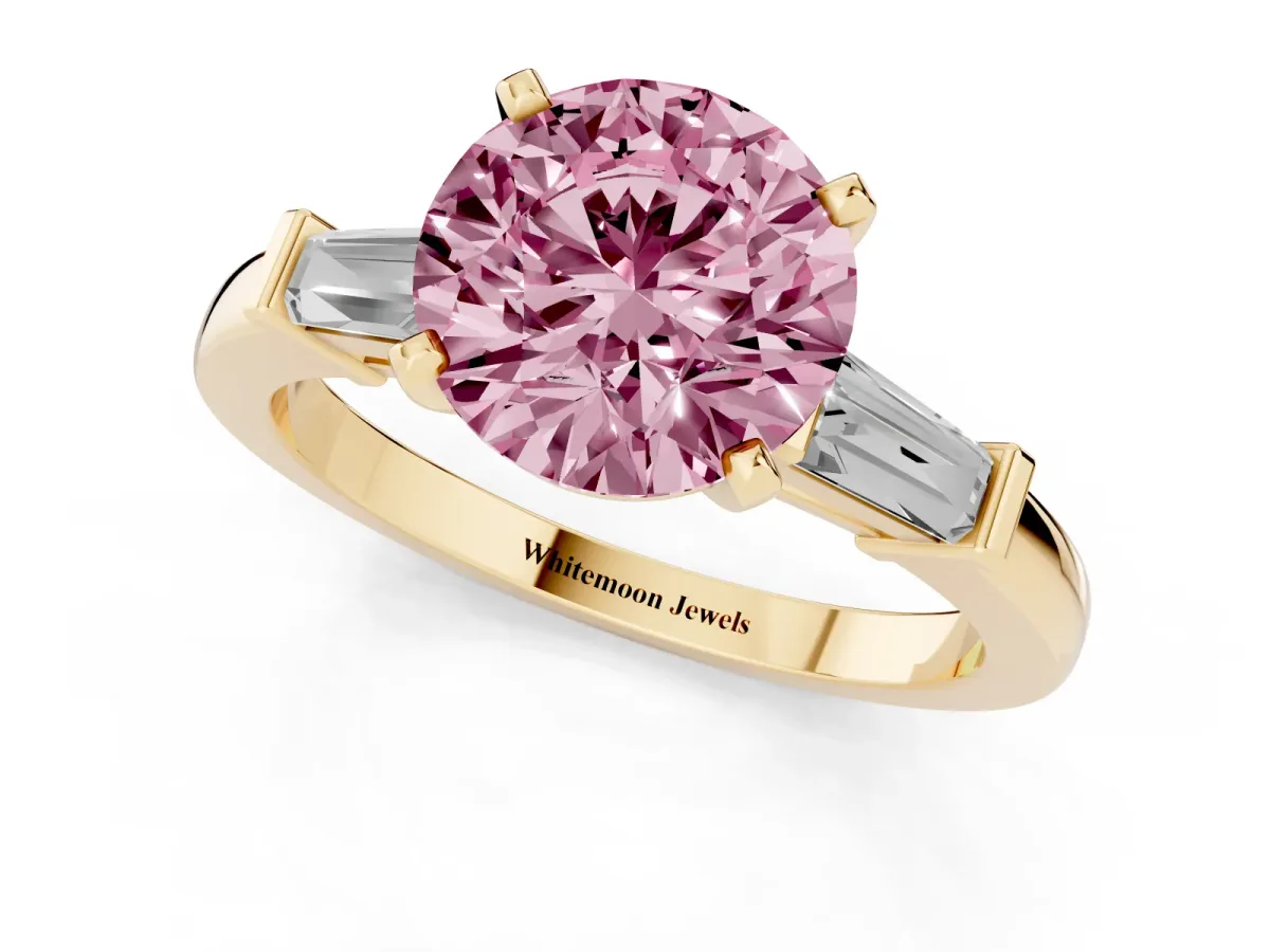 Fancy Pink Round Cut Cut Diamond Solitaire Ring with Tapered Baguette Accents and Four-Prong Setting Yellow gold