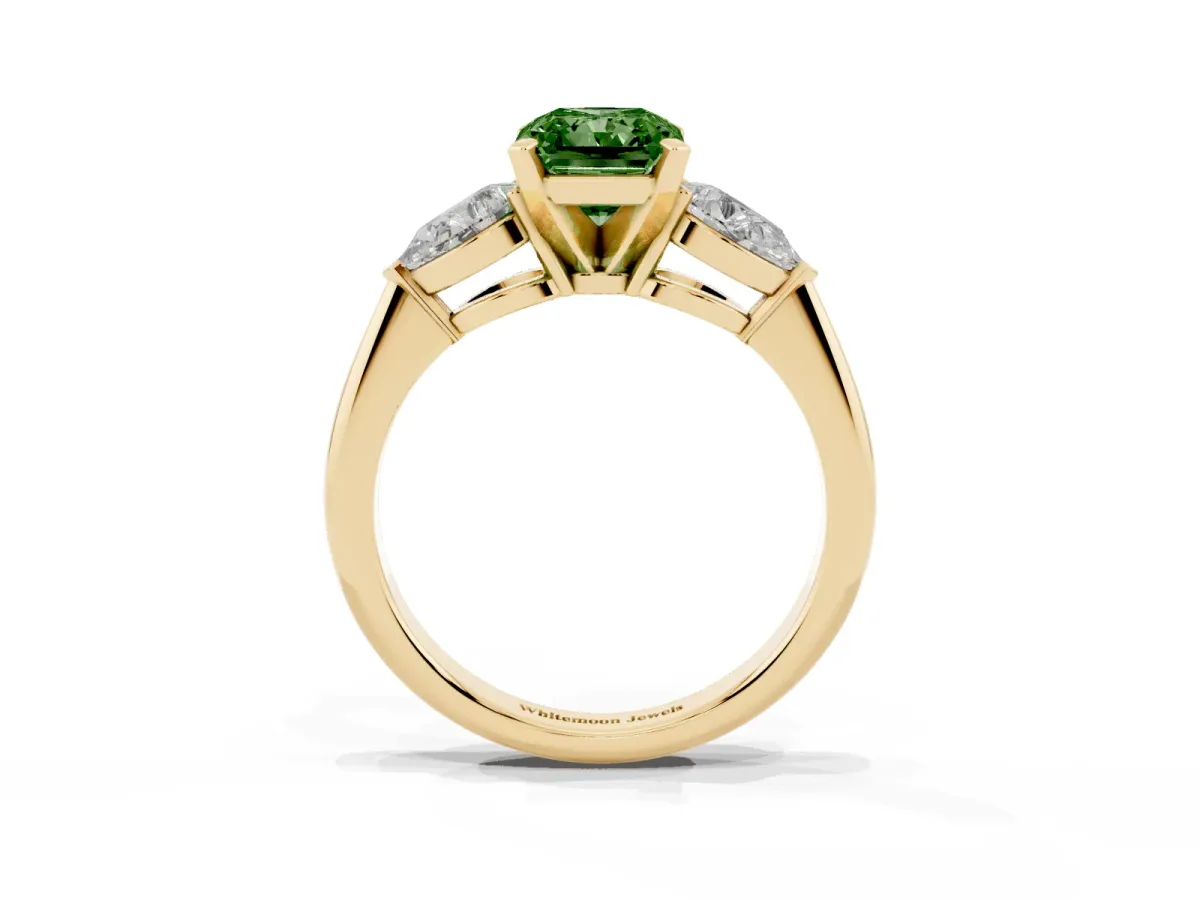 Fancy Green Three-Stone Radiant Cut Diamond Ring with Pear Side Stones and Four-Prong Setting Yellow gold