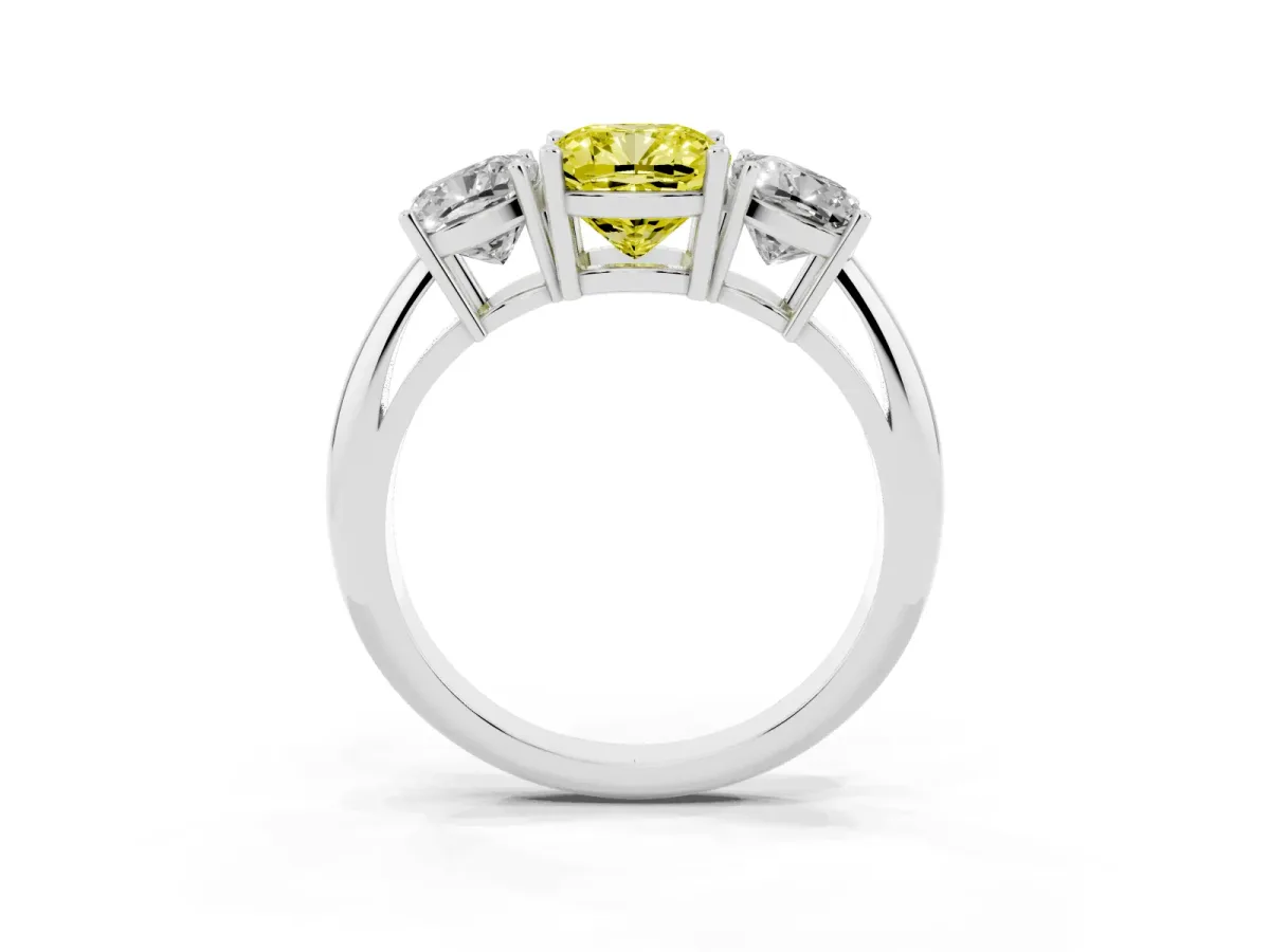 Fancy Yellow Three-Stone Cushion Cut Cut Diamond Engagement Ring with Prong Setting on a White Gold Band White gold