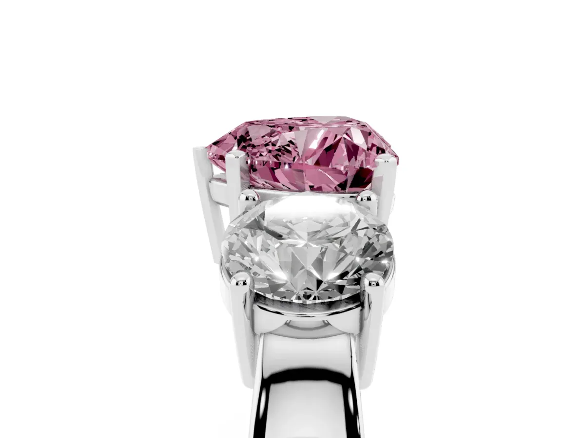 Fancy Pink Three-Stone Heart Cut Diamond Ring with Round Side Stones, Classic Band, and Four-Prong Setting Silver