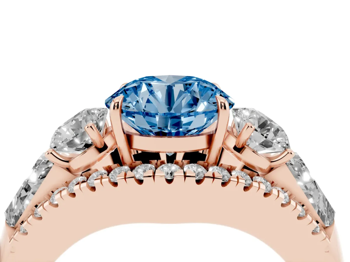 Fancy Blue Three-Stone Round Cut Diamond Engagement Ring with Pave Band and Prong Setting Rose gold