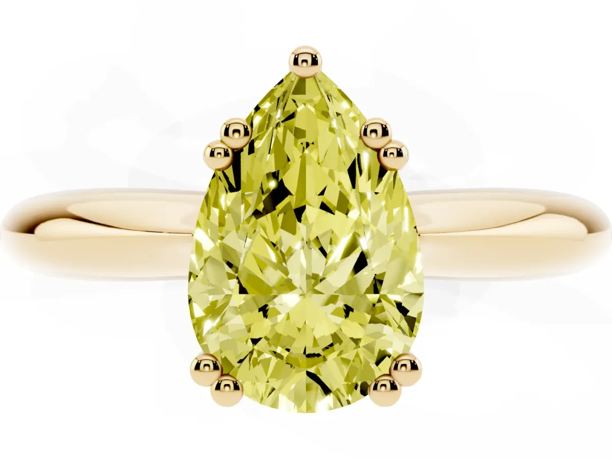 Fancy Yellow Pear Cut Cut Solitaire Engagement Ring with Tapered Band and Four-Prong Setting Yellow gold