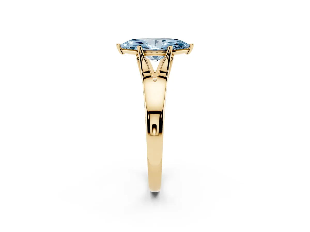 Fancy Blue Marquise Cut Solitaire Diamond Ring with Cathedral Band and Four-Prong Setting Yellow gold