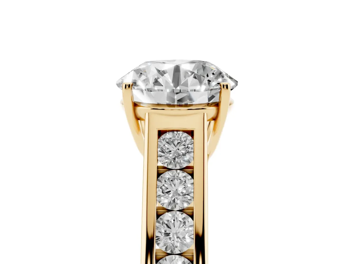Round Cut Brilliant Channel-Set Solitaire Ring with Four-Prong Setting Yellow gold