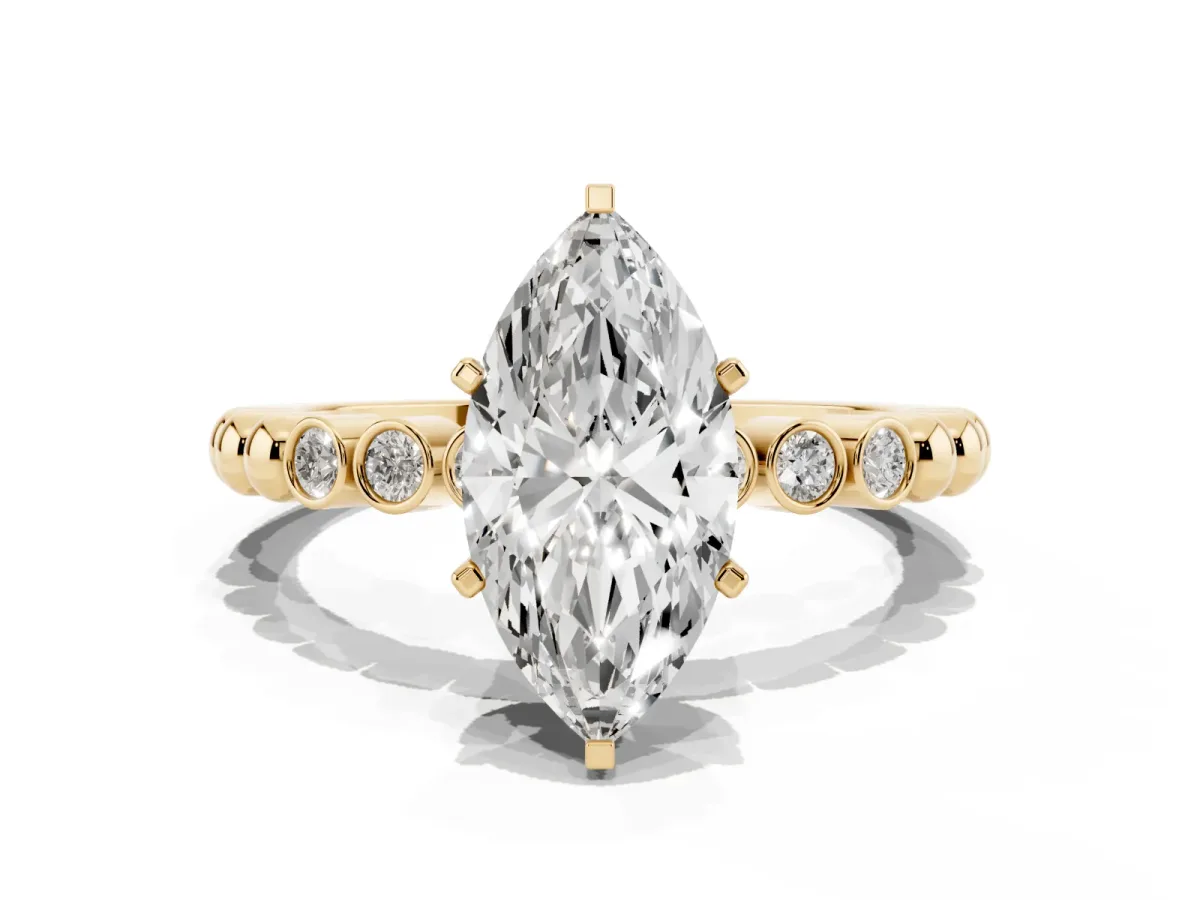 Marquise Cut Solitaire Bezel Accent Diamond Engagement Ring with Beaded Band and Four-Prong Setting Yellow gold
