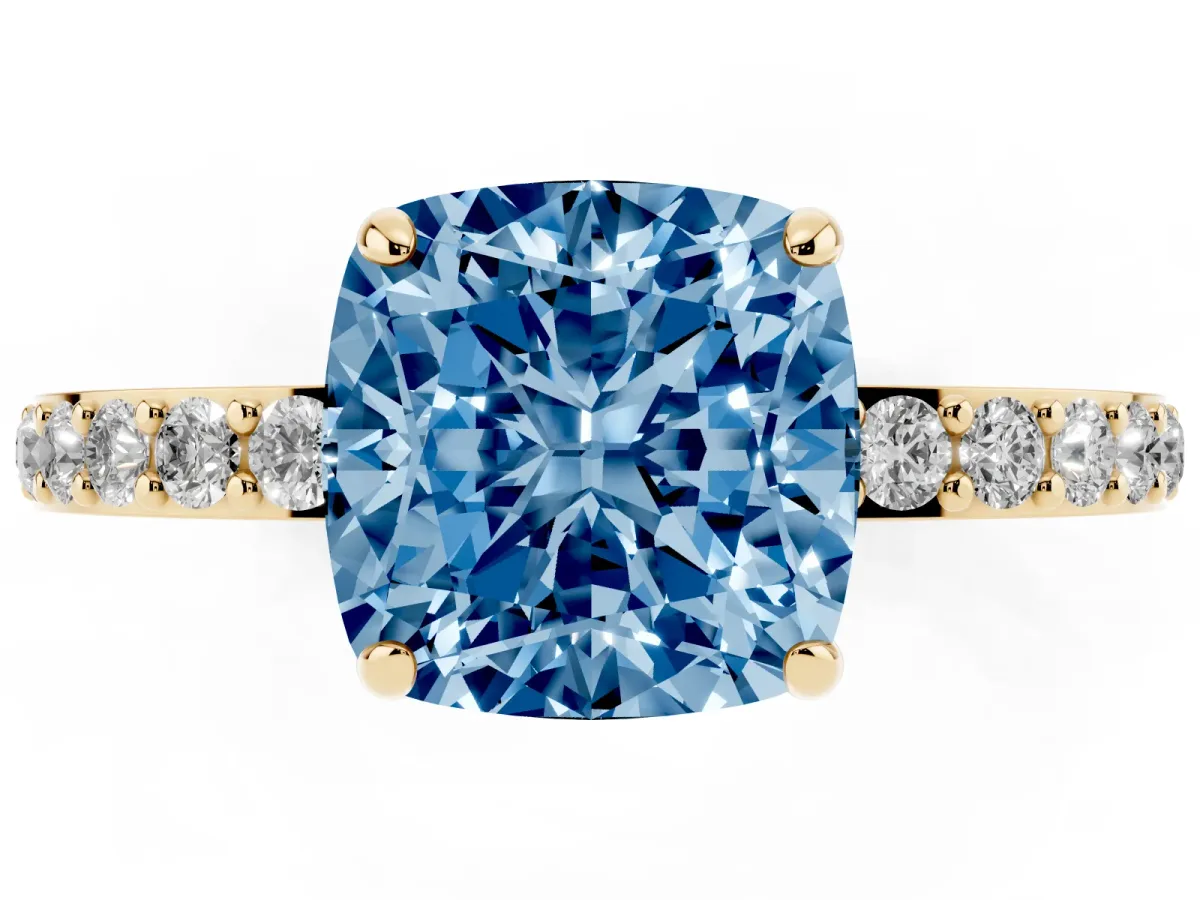 Fancy Blue Cushion Cut Diamond Solitaire Engagement Ring with Pavé Band and Four-Prong Setting Yellow gold