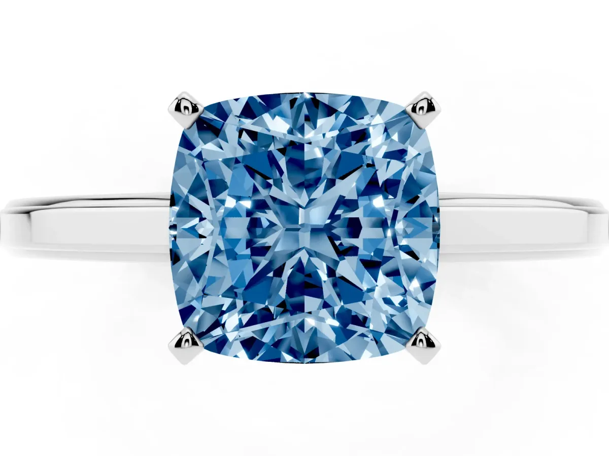 Fancy Blue Cushion Cut Solitaire Diamond Ring with Four-Prong Setting and Classic Band Platinum