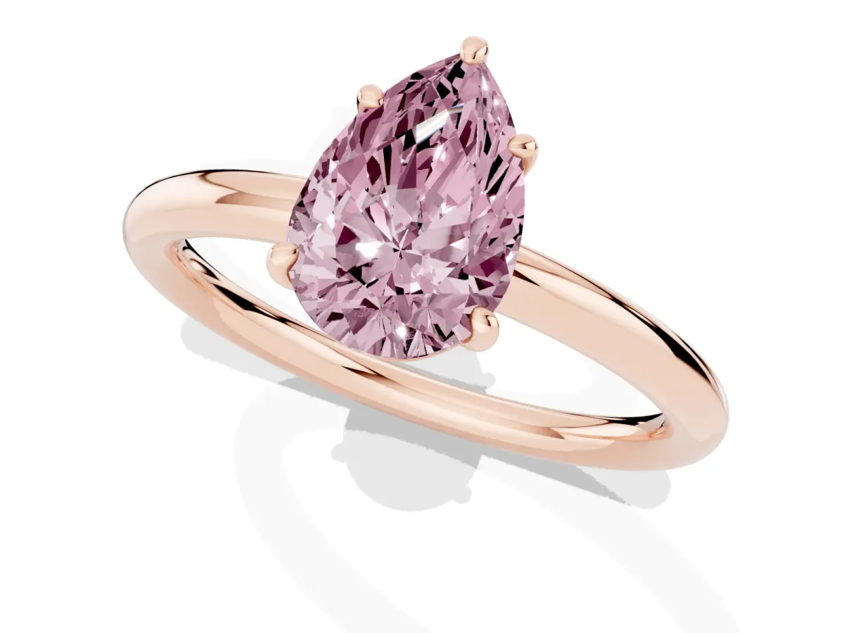 Fancy Pink Pear Cut Solitaire Diamond Ring with Four-Prong Setting on a Plain Band Rose gold