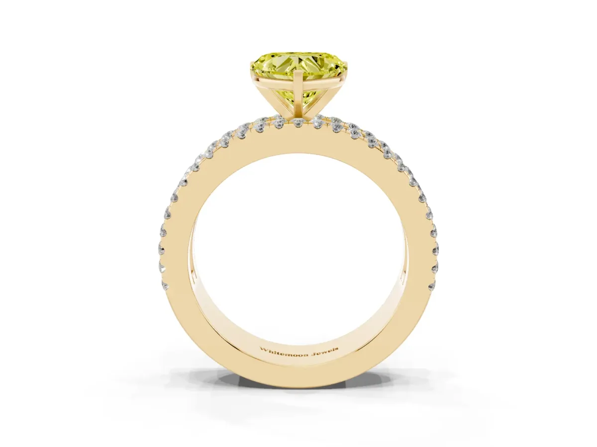 Fancy Yellow Heart Cut Diamond Solitaire Ring with Pavé and Channel Set Band Yellow gold