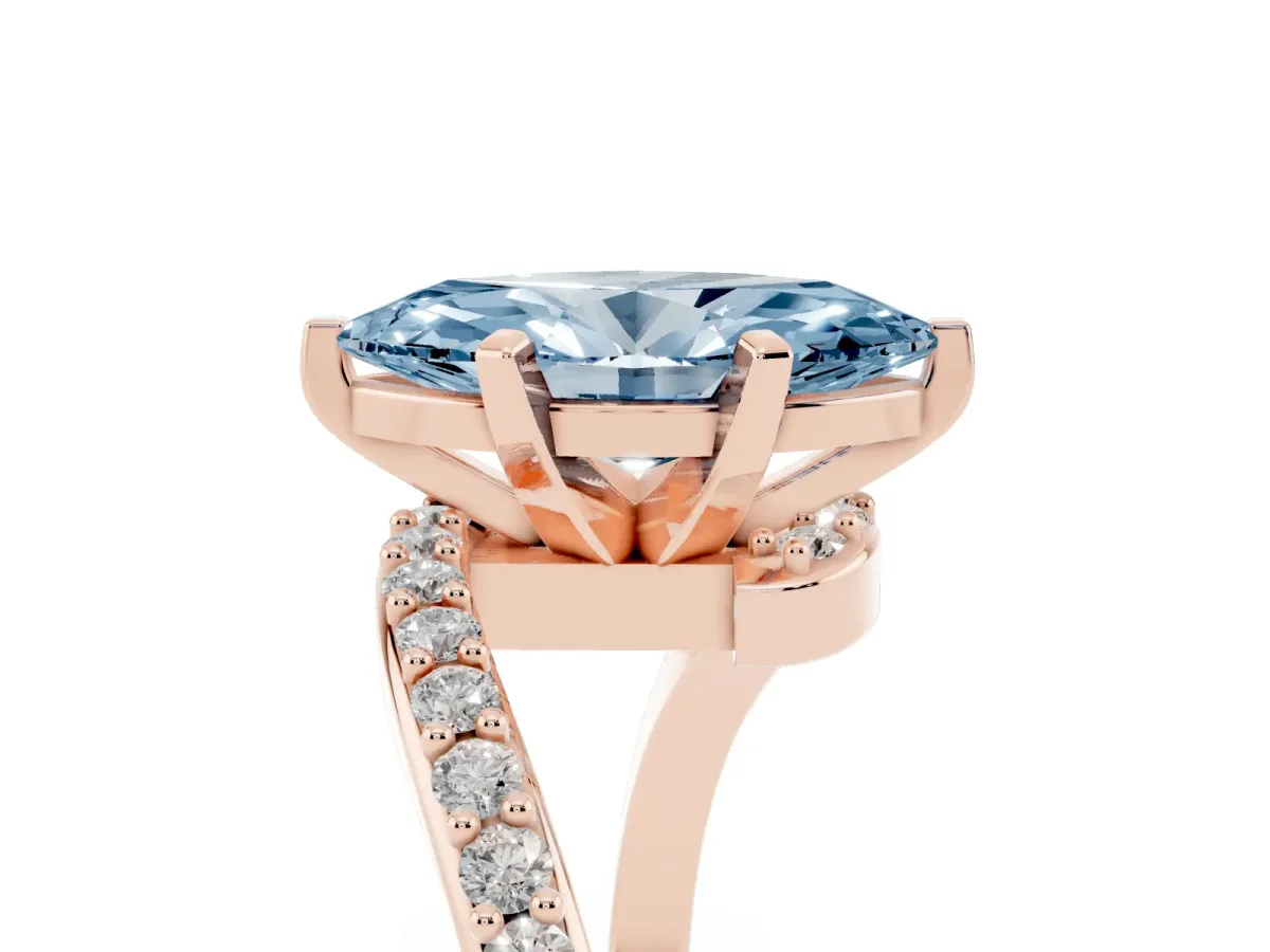 Fancy Blue Marquise Cut Solitaire Twist Band with Pave Set Diamonds and Four-Prong Setting Rose gold