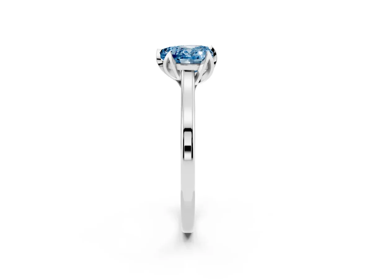 Fancy Blue Heart Cut Diamond Solitaire Ring with Flower Prong Setting and Classic Band Silver