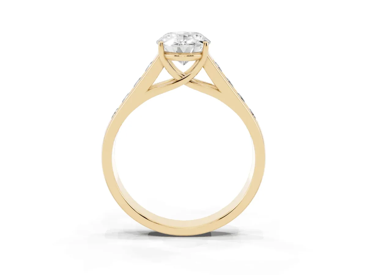 Oval Cut Solitaire Channel-Set Diamond Engagement Ring with Four-Prong Setting Yellow gold