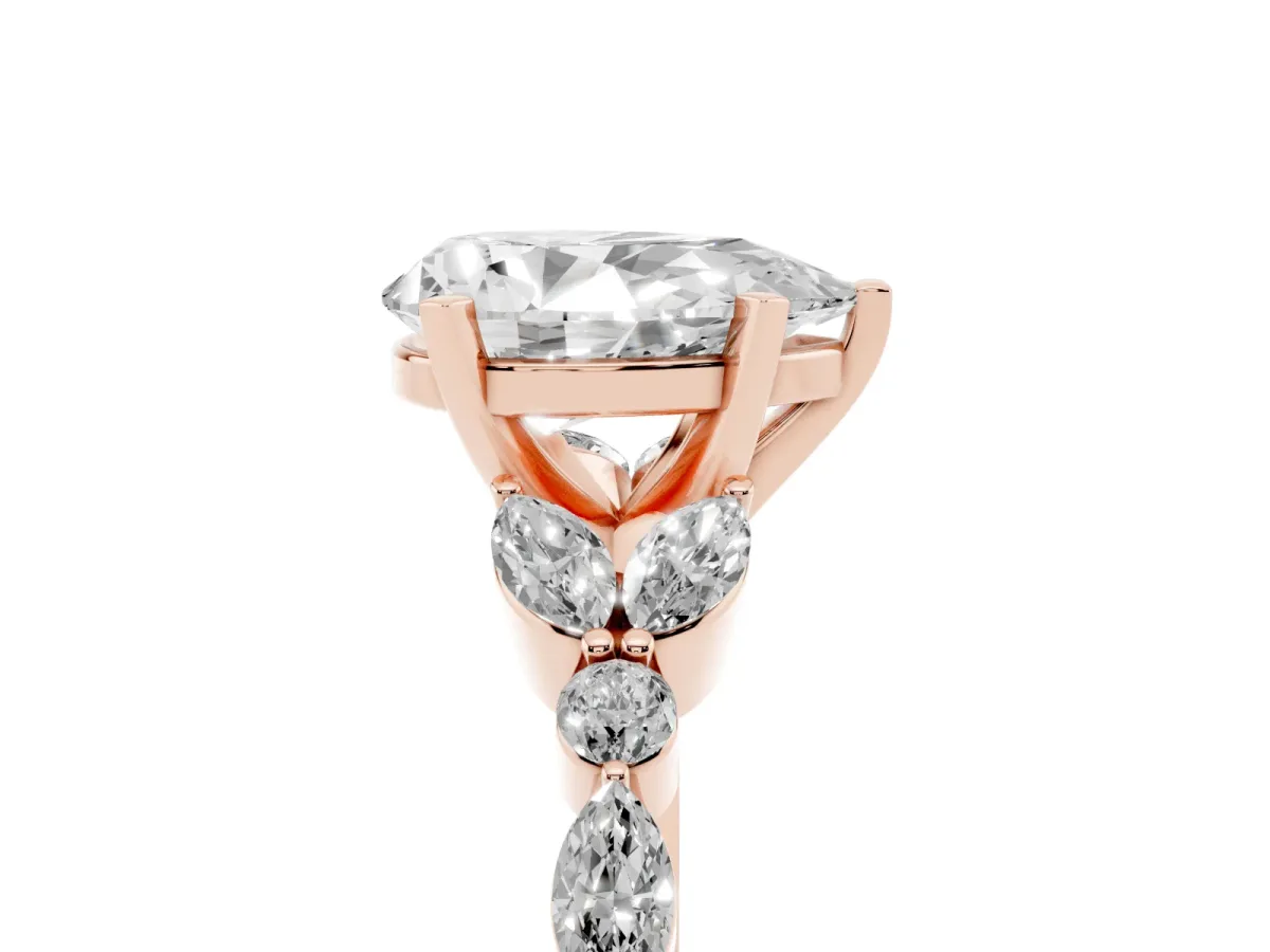 Pear Cut Diamond Solitaire Ring with Side Stones and Four-Prong Setting Rose gold