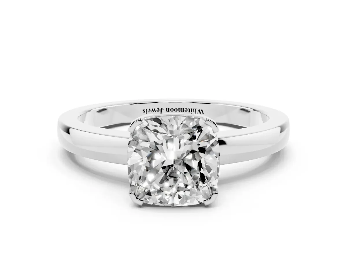 Cushion Cut Cut Solitaire Ring with Four-Prong Setting and Classic Band Silver