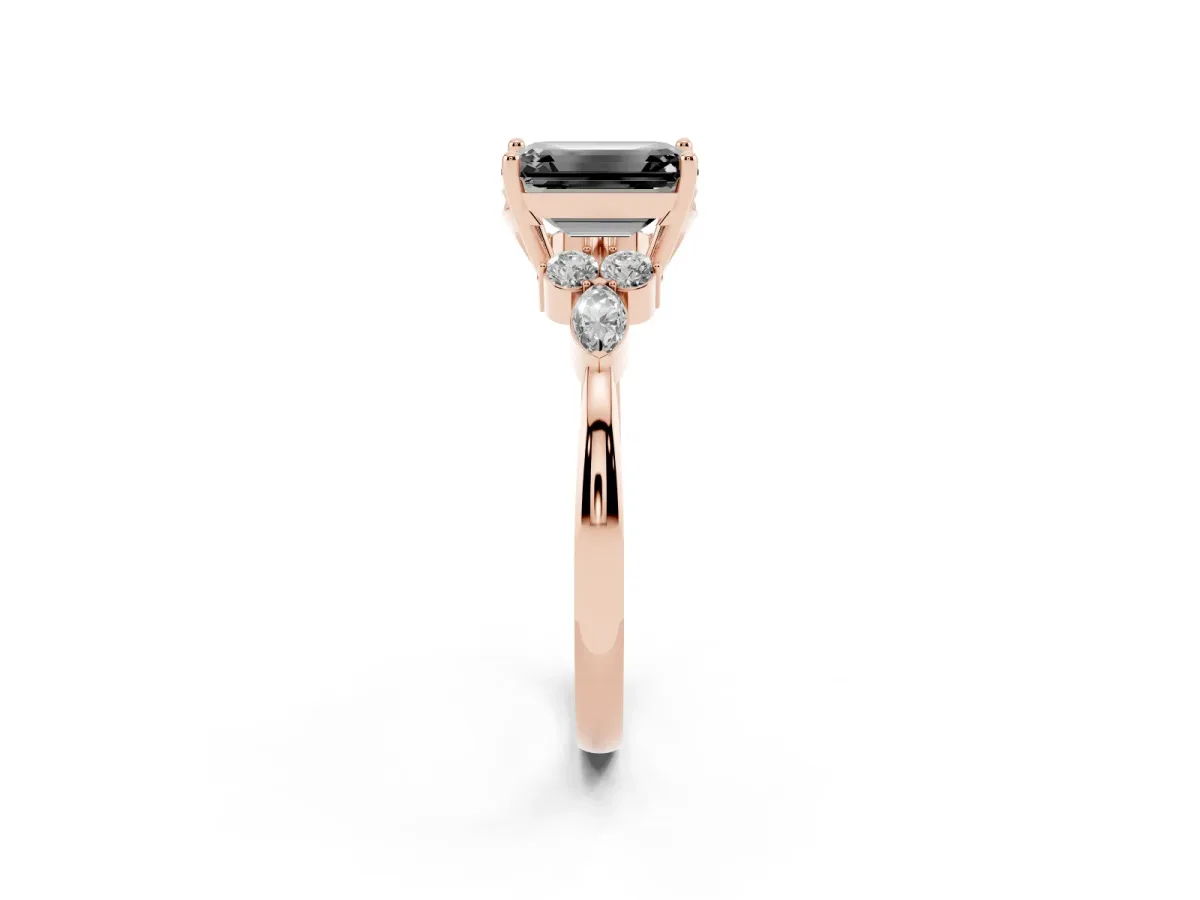 Fancy Black Emerald Cut Brilliant Diamond Solitaire Ring with Pear Side Stones and Four-Prong Setting Rose gold