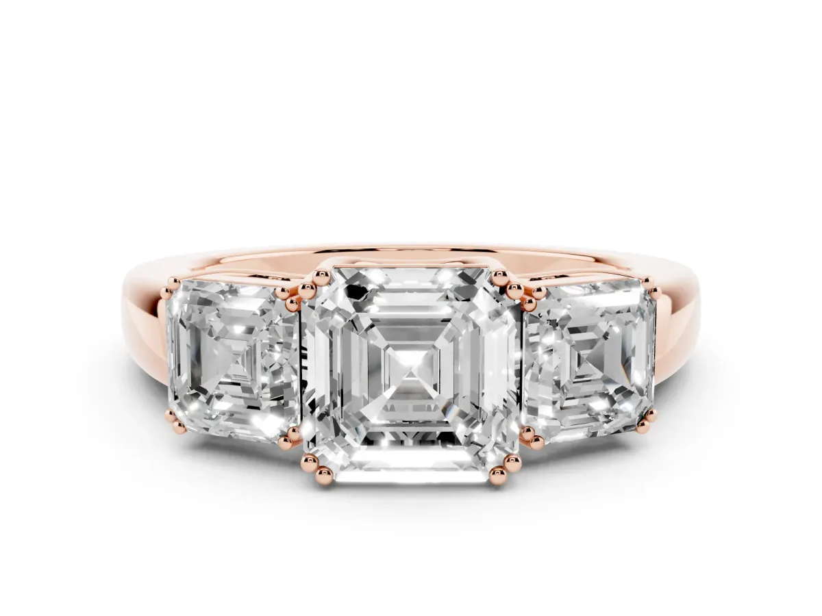 Three-Stone Asscher Cut Cut Diamond Ring with Channel Set Band and Four-Prong Setting Rose gold