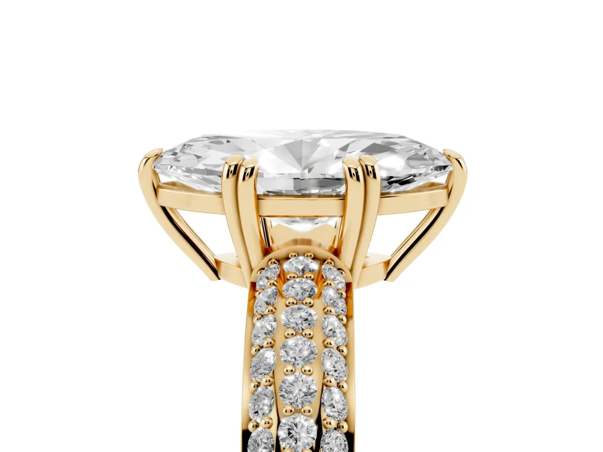 Marquise Cut Diamond Solitaire Ring with Multi-Row Round Pavé Band and Prong Setting Yellow gold
