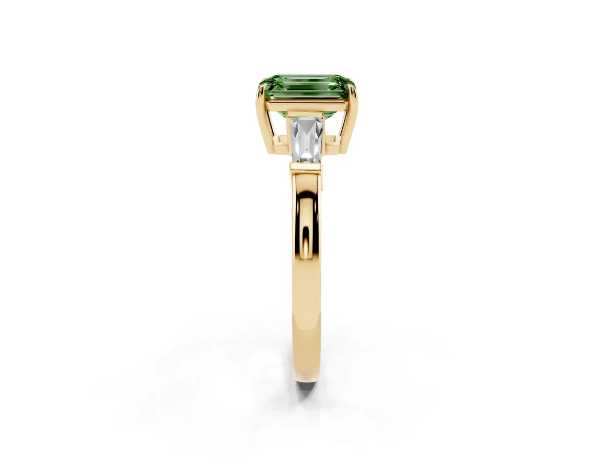 Fancy Green Emerald Cut Diamond Three-Stone Ring with Tapered Baguette Side Stones and Prong Setting Yellow gold