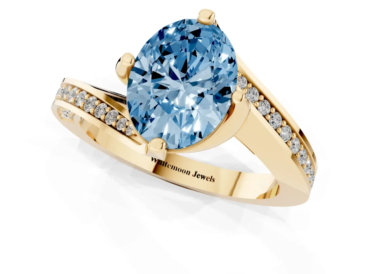 Fancy Blue Oval Cut Solitaire Diamond Twist Band with Pavé Setting and Four-Prong Setting Yellow gold