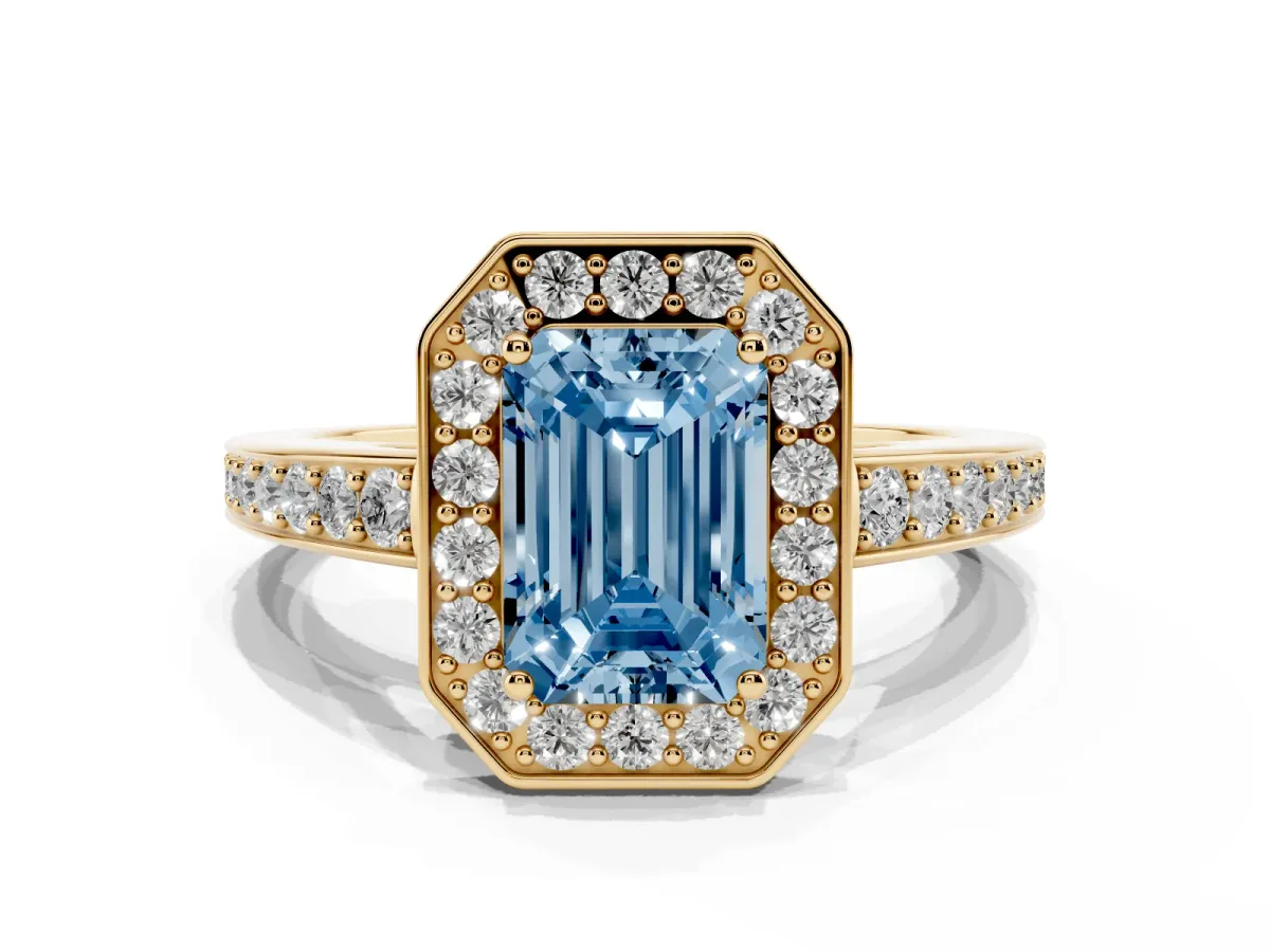 Fancy Blue Emerald Cut Halo Pavé Diamond Engagement Ring with Bezel Setting Yellow gold
