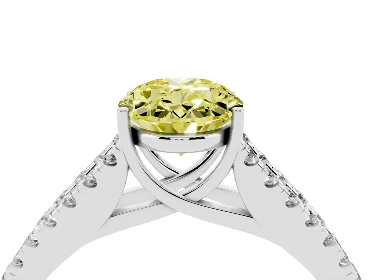 Fancy Yellow Oval Cut Diamond Split Shank Engagement Ring with Round Pavé and Prong Setting Platinum