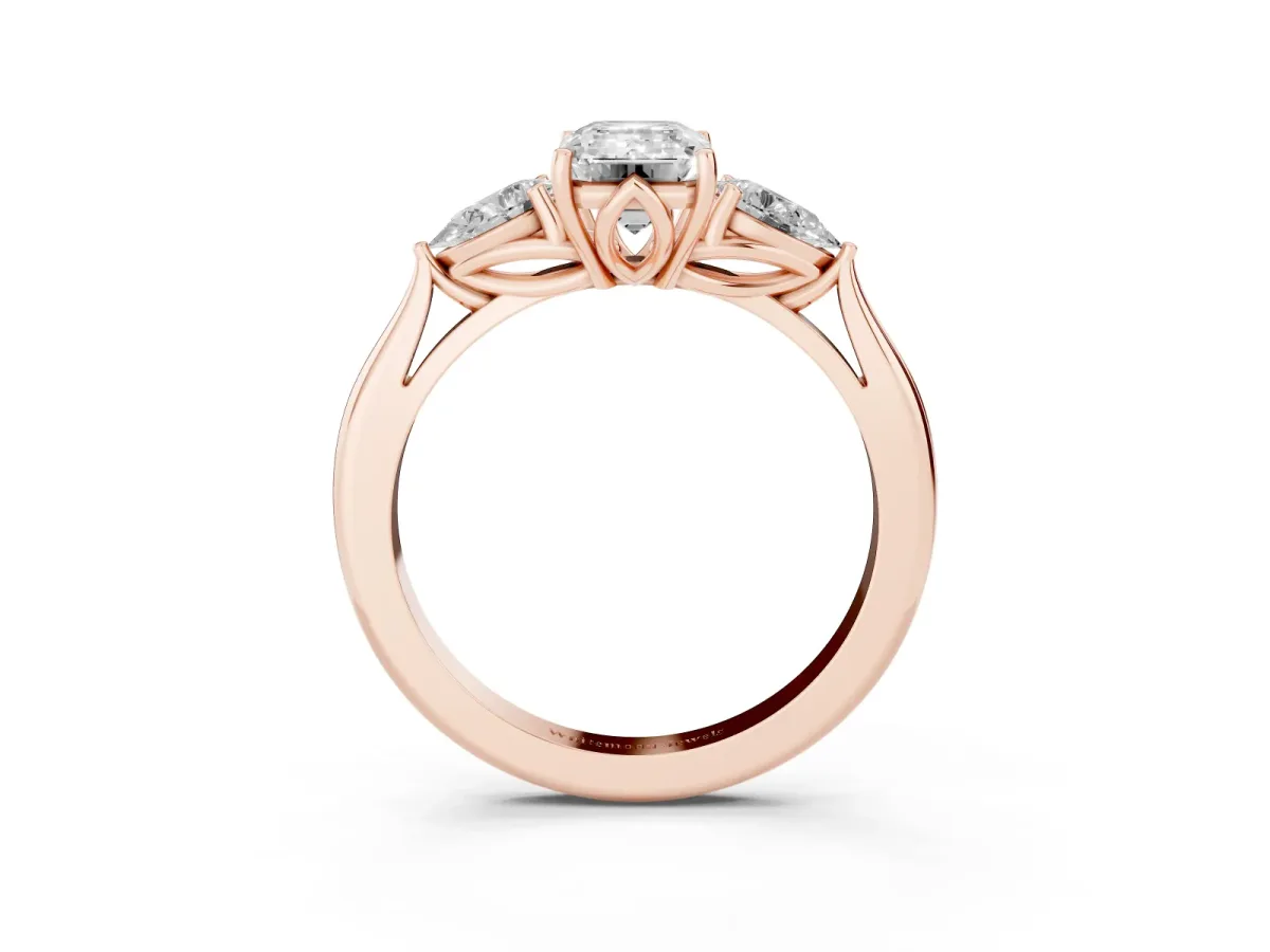 Emerald Cut Diamond Three-Stone Ring with Pear Side Stones and Prong Setting Rose gold