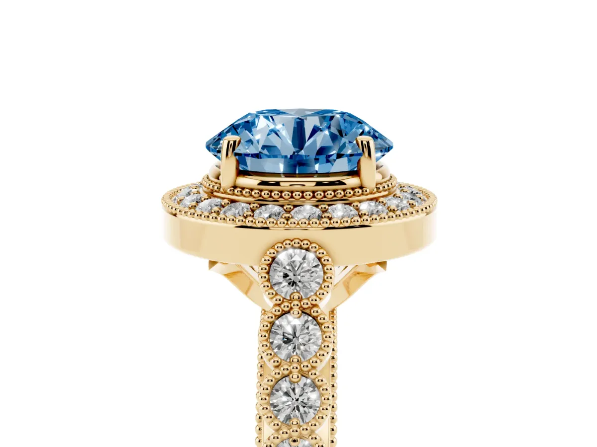 Fancy Blue Round Cut Halo Milgrain Solitaire with Bezel Set Side Stones and Pave Band Yellow gold